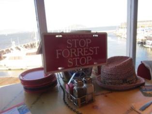 "Stop Forrest Stop" signpost to call for a waiter.