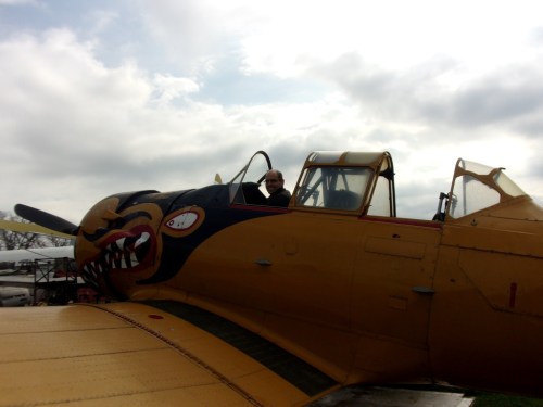 Posing from the cockpit of a North American T-6G Texan.